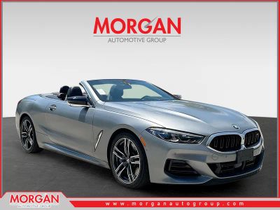 2023 BMW 8 Series M850i xDrive in Frozen Pure Grey Metallic — front three-quarter view