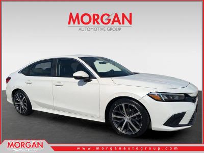 2022 Honda Civic Sedan Touring in Platinum White Pearl — front three-quarter view