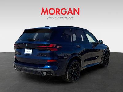 2026 BMW X5 — rear three-quarter view
