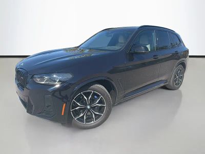 2023 BMW X3 M40i in Carbon Black Metallic — front three-quarter view
