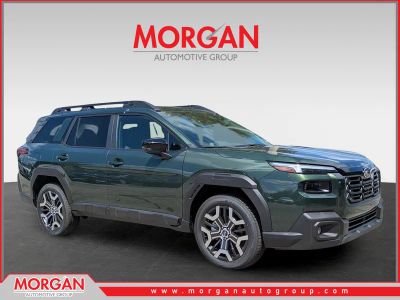 2026 Subaru Outback Touring XT in Deep Emerald Green Pearl — front three-quarter view