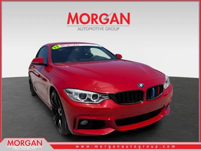 2017 BMW 4 Series 430i in Melbourne Red Metallic — front three-quarter view