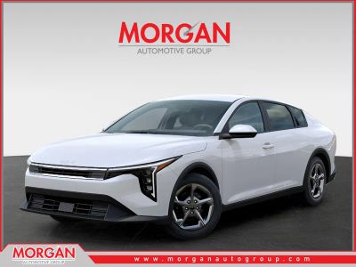 2026 Kia K4 LXS in Snow White Pearl — front three-quarter view