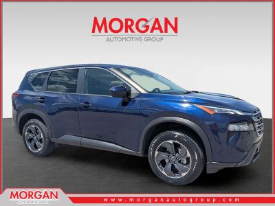 2024 Nissan Rogue SV in Deep Ocean Blue Pearl — front three-quarter view