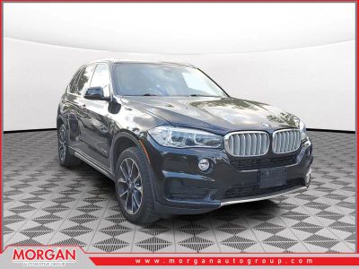2017 BMW X5 xDrive40e iPerformance in Jet Black — front three-quarter view