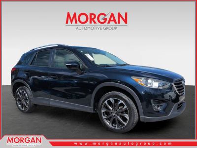 2016 Mazda CX-5 Grand Touring in Blue — front three-quarter view
