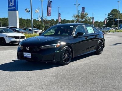 2026 Honda Civic Sedan Hybrid Sport in Blue Lagoon Pearl — front three-quarter view