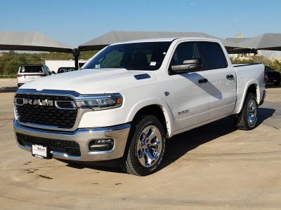 2026 RAM 1500 Big Horn/Lone Star in Bright White Clearcoat — front three-quarter view