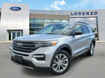 2024 Ford Explorer XLT in Iconic Silver Metallic — front three-quarter view