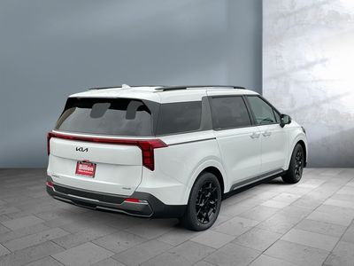 2026 Kia Carnival — rear three-quarter view
