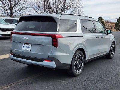 2026 Kia Carnival — rear three-quarter view