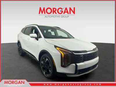 2026 Kia Sportage SX-Prestige in Glacial White Pearl — front three-quarter view