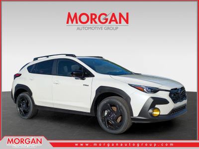 2026 Subaru Crosstrek Sport Hybrid in Crystal White Pearl — front three-quarter view