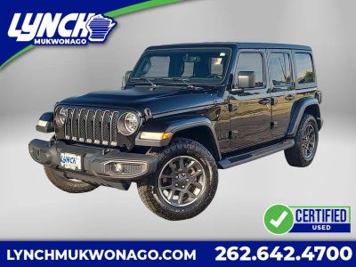2021 Jeep Wrangler Unlimited 80th Anniversary in Black Clearcoat — front three-quarter view