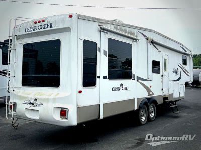 2005 Forest River Cedar Creek — side profile view