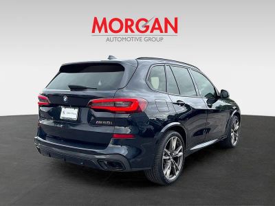 2021 BMW X5 — rear three-quarter view