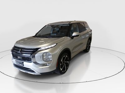 2024 Mitsubishi Outlander — rear three-quarter view