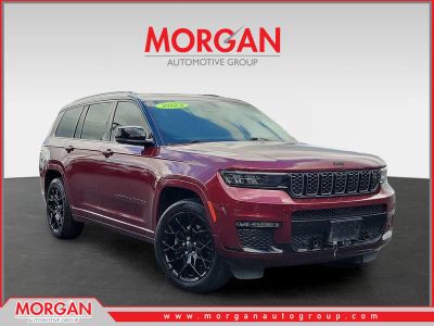 2023 Jeep Grand Cherokee L Summit in Velvet Red Pearlcoat — front three-quarter view