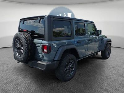 2026 Jeep Wrangler — rear three-quarter view