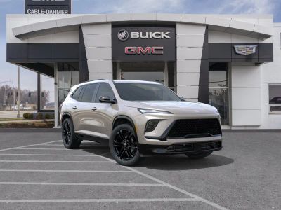 2026 Buick Enclave Sport Touring in Stone Metallic — front three-quarter view