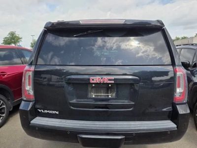 2017 GMC Yukon — rear three-quarter view