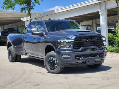 2026 RAM 3500 RAM 3500 LARAMIE CREW CAB 4X4 8' BOX in Forged Blue Metallic Exterior Paint — front three-quarter view