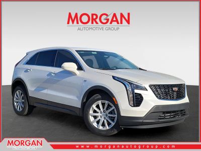 2021 Cadillac XT4 AWD Luxury in White — front three-quarter view