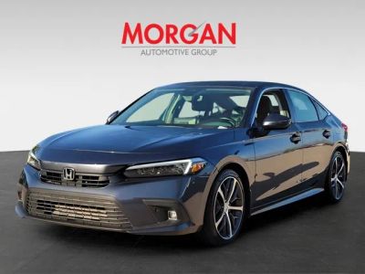 2023 Honda Civic Sedan — rear three-quarter view