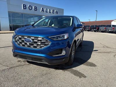 2023 Ford Edge Titanium in Atlas Blue — front three-quarter view