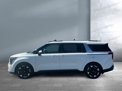 2026 Kia Carnival — rear three-quarter view