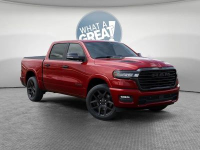 2026 RAM 1500 Laramie in Molten Red Pearl-Coat Exterior Paint — front three-quarter view