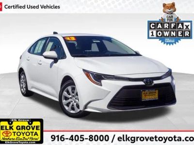 2023 Toyota Corolla LE in White — front three-quarter view