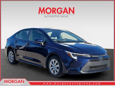 2023 Toyota Corolla Hybrid LE in Blueprint — front three-quarter view