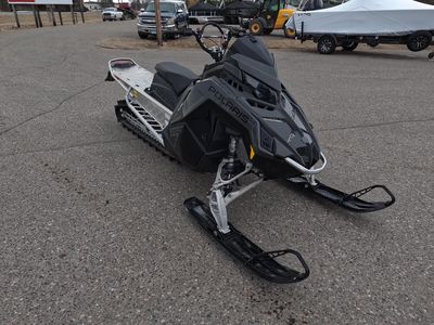 2024 Polaris 850 PRO RMK 155 S24TFK8RS in Gloss Black / Shadow Gray — front three-quarter view