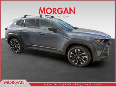 2026 Mazda CX-50 Hybrid Premium Plus in Gray — front three-quarter view
