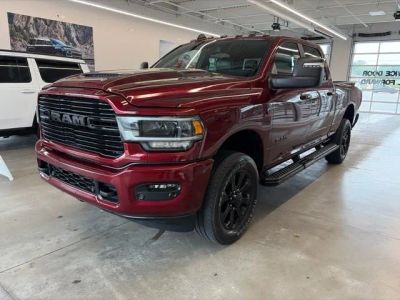 2024 RAM 2500 Laramie in Red — front three-quarter view