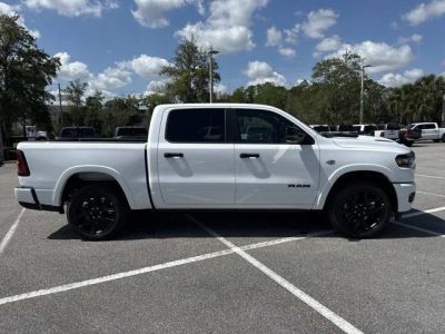2026 RAM 1500 Laramie in Bright White Clearcoat — front three-quarter view