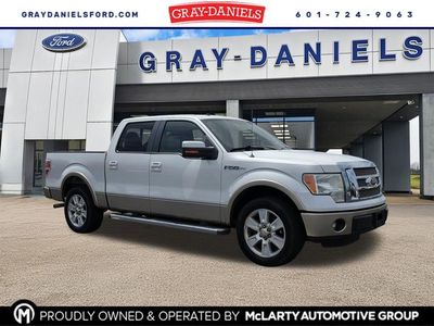 2011 Ford F-150 Lariat in Oxford White — front three-quarter view