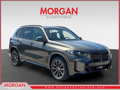 2026 BMW X5 xDrive40i in Manhattan Green Metallic — front three-quarter view