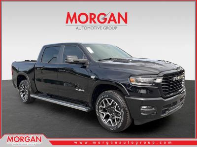 2026 Ram 1500 Laramie in Black — front three-quarter view