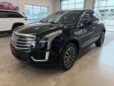 2019 Cadillac XT5 Luxury in Stellar Black Metallic — front three-quarter view