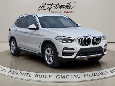 2020 BMW X3 xDrive30i in Alpine White — front three-quarter view