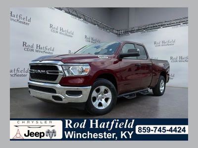2024 RAM 1500 Tradesman Quad Cab 4x4 6'4' Box in Maroon — front three-quarter view