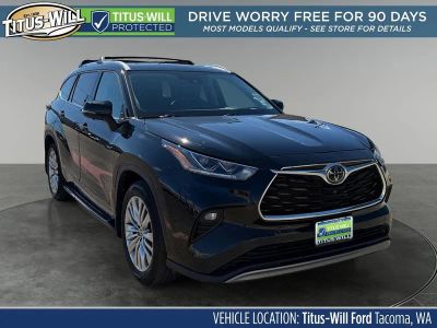 2024 Toyota Highlander Platinum in Midnight Black Metallic — front three-quarter view