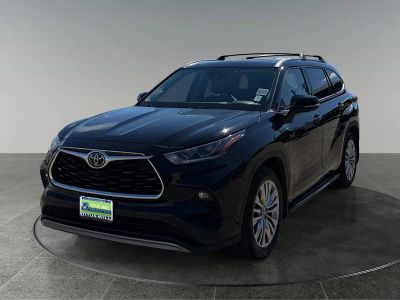 2024 Toyota Highlander — rear three-quarter view