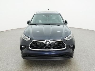 2026 Toyota Highlander Hybrid — rear three-quarter view