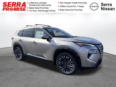 2026 Nissan Rogue Platinum in Champagne Silver Metallic — front three-quarter view