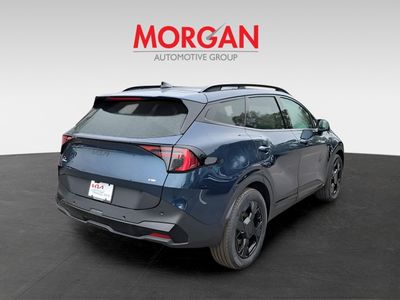 2026 Kia Sportage Plug-In Hybrid — rear three-quarter view