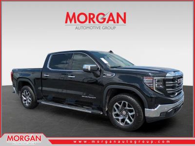 2024 GMC Sierra 1500 SLT in Black — front three-quarter view