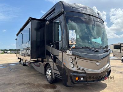 2019 Fleetwood Discovery LXE — front three-quarter view